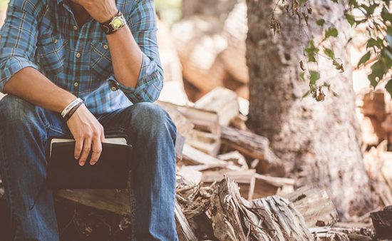 how to get rid of anxiety man sitting alone in woods